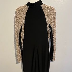 Gold and black knee length dress